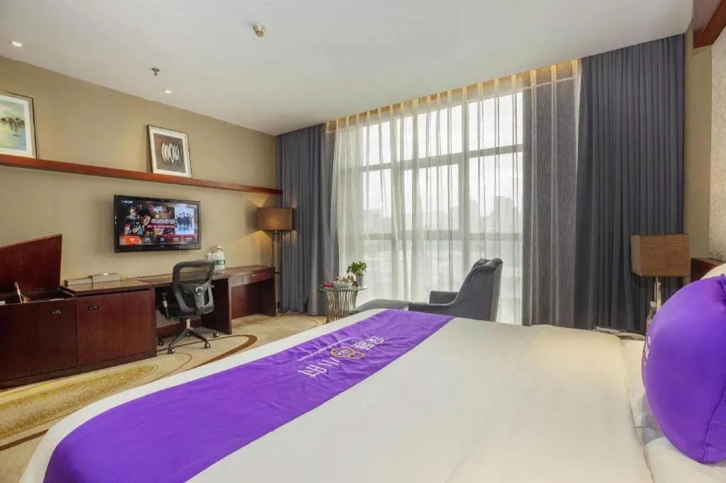 Bed in Quanzhou Jinjiang Hollyston Hotel