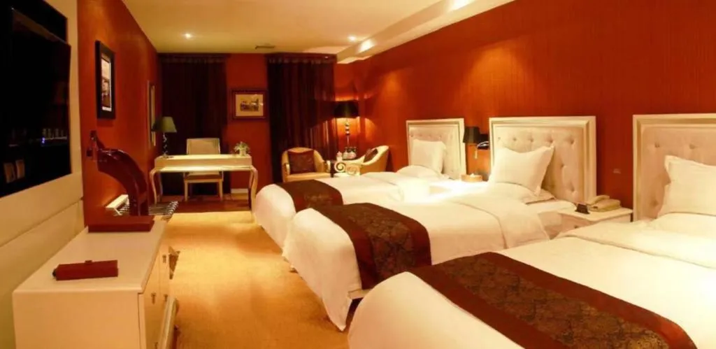 Bed in Metropark Hotel