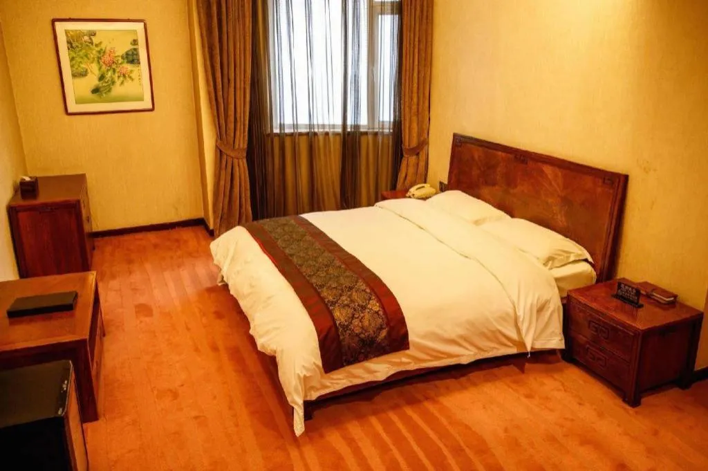 Bed in Metropark Hotel