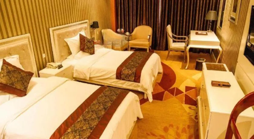Bed in Metropark Hotel