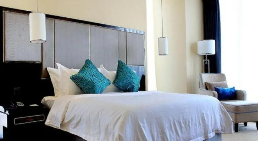 Bed in Pacific Regency Hotel Shenyang