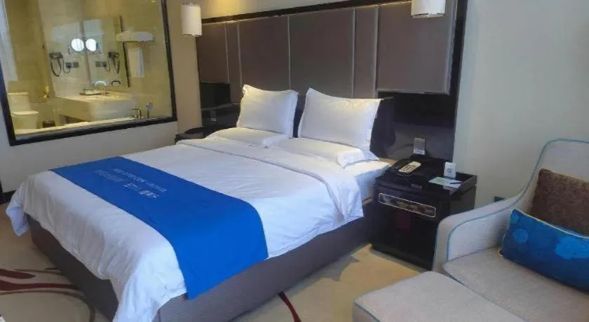 Bed in Pacific Regency Hotel Shenyang