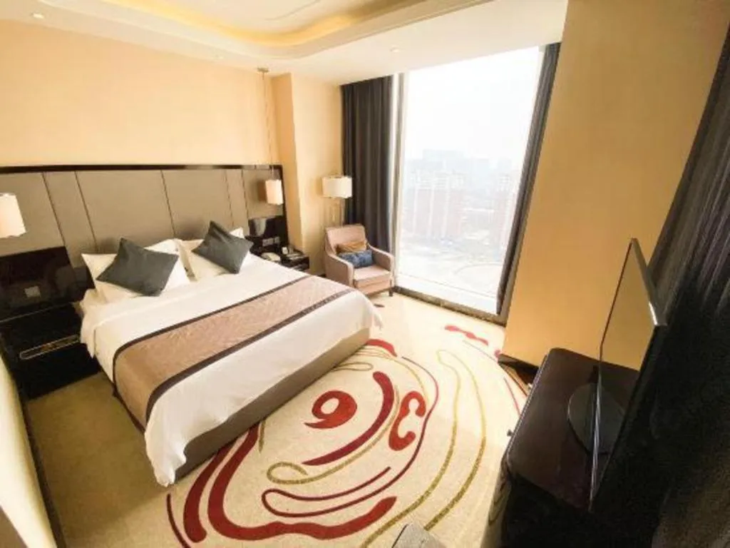 Bed in Pacific Regency Hotel Shenyang