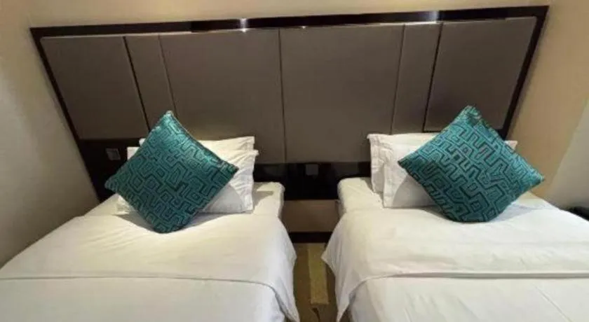 Bed in Pacific Regency Hotel Shenyang