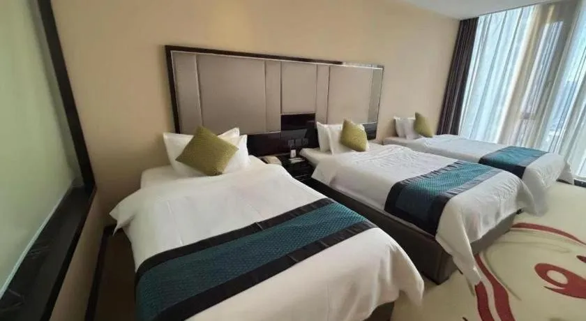 Bed in Pacific Regency Hotel Shenyang