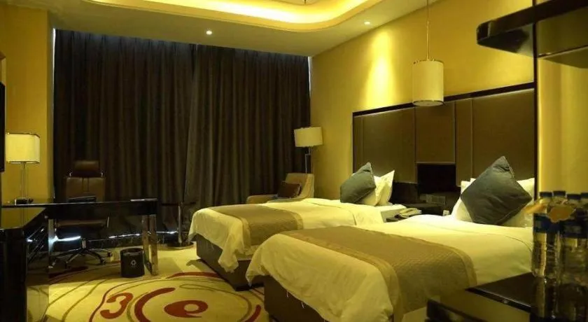 Bed in Pacific Regency Hotel Shenyang