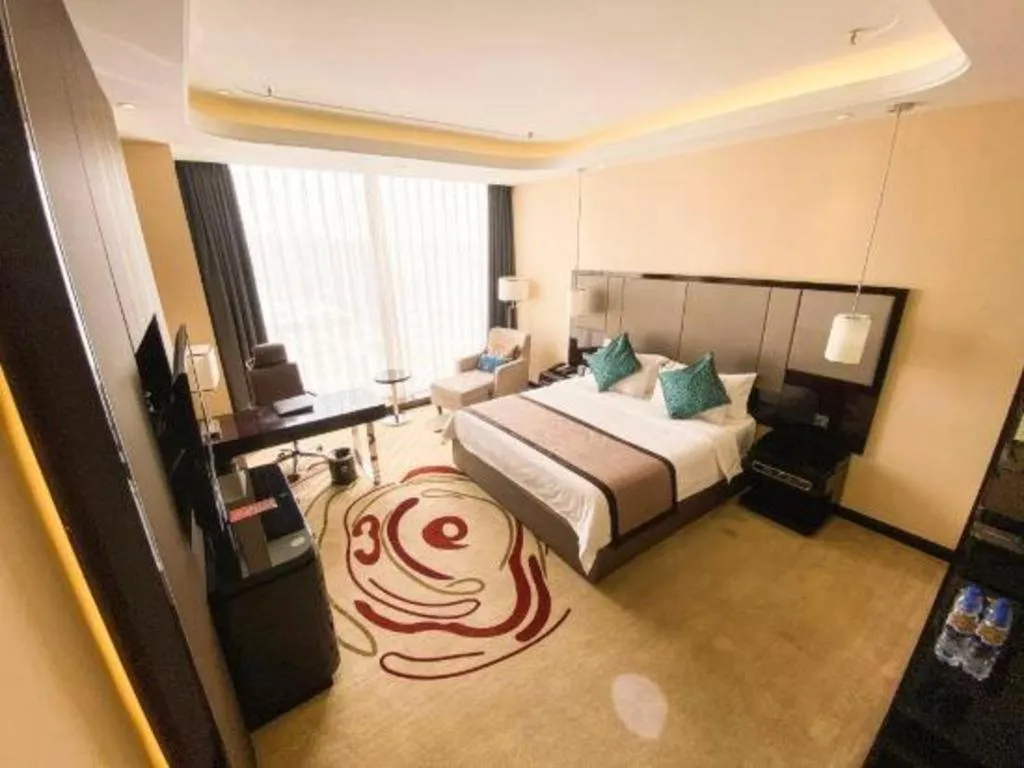 Bed in Pacific Regency Hotel Shenyang