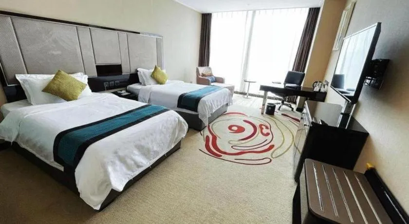Bed in Pacific Regency Hotel Shenyang