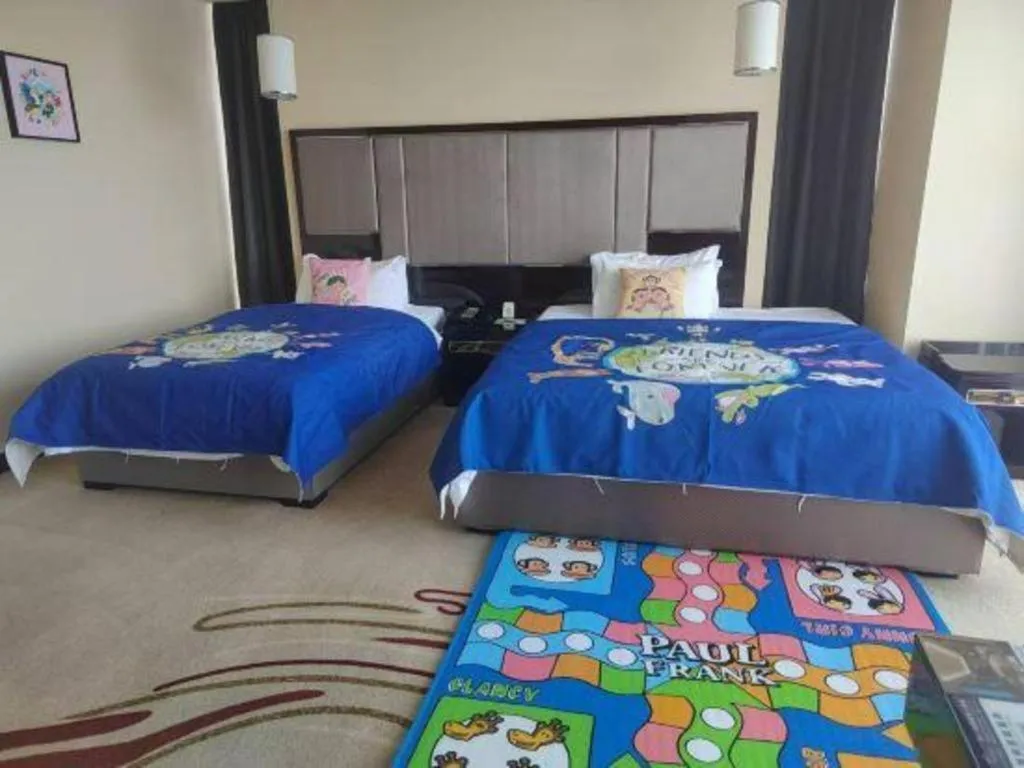 Bed in Pacific Regency Hotel Shenyang