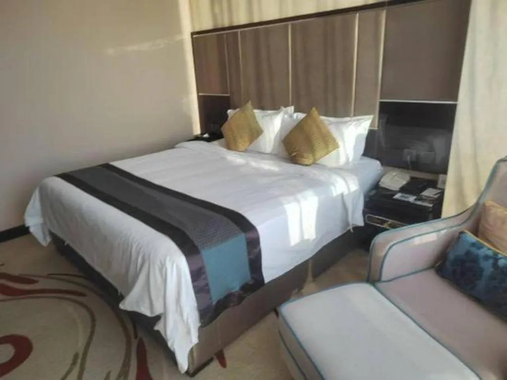 Bed in Pacific Regency Hotel Shenyang