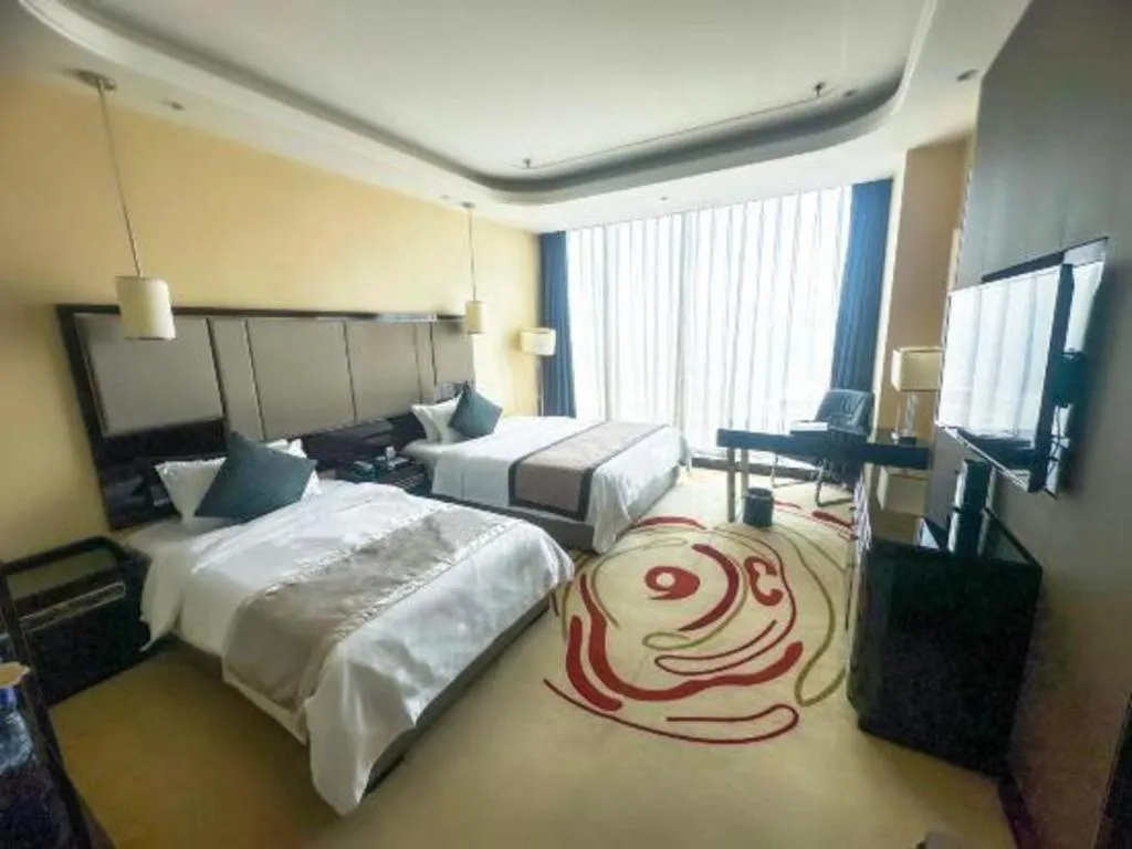 Bed in Pacific Regency Hotel Shenyang
