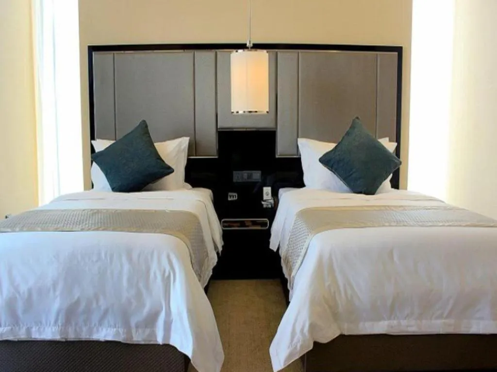 Bed in Pacific Regency Hotel Shenyang