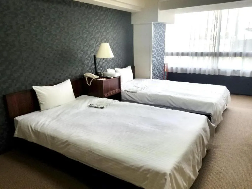 Bed in Hotel Town Center