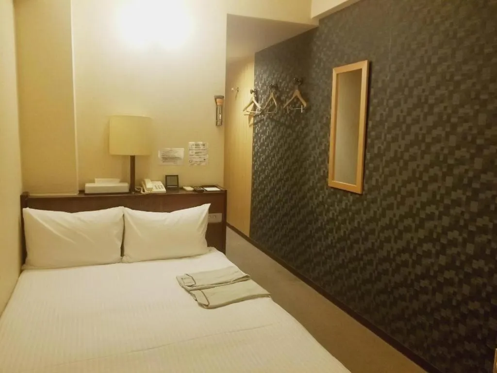 Bed in Hotel Town Center