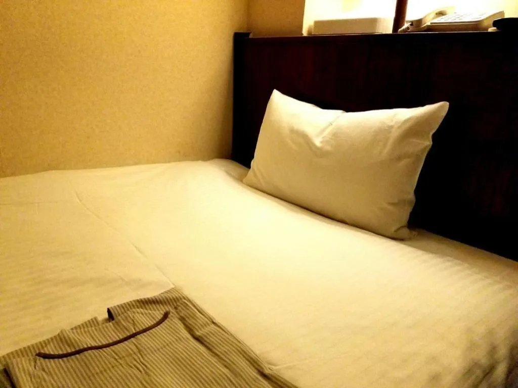 Bed in Hotel Town Center