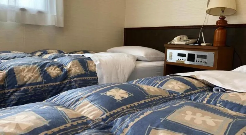 Bed in Hotel Town Nishikigawa