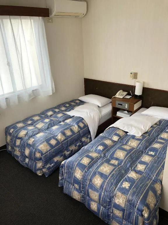 Bed in Hotel Town Nishikigawa