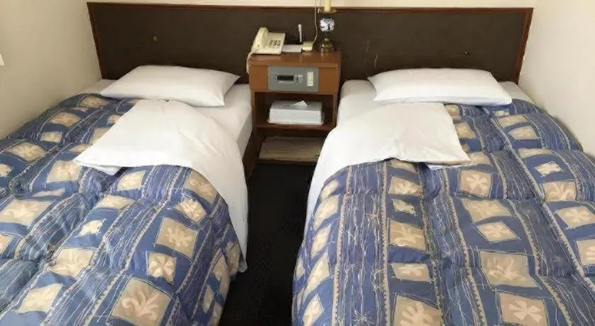 Bed in Hotel Town Nishikigawa