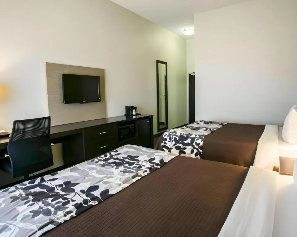 Bed in Sleep Inn & Suites Dripping Springs - Austin Area