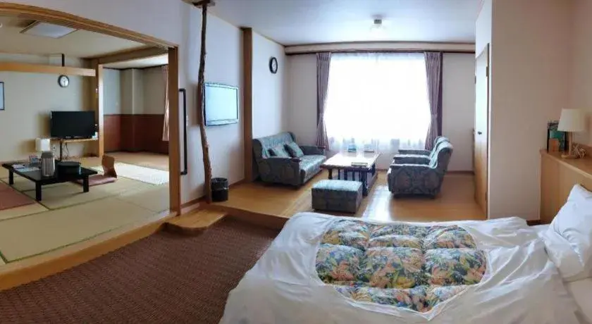 Bed in Kirishima Onsen Ryokojin Sanso Bed in Kirishima Onsen Ryokojin Sanso