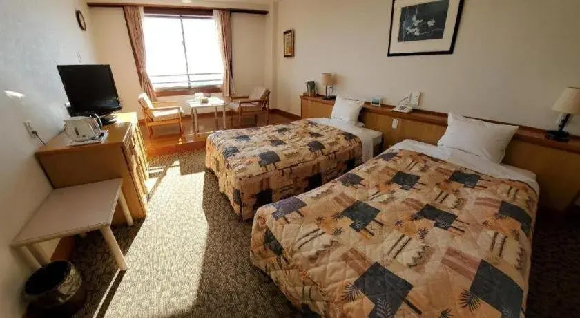 Bed in Kirishima Onsen Ryokojin Sanso Bed in Kirishima Onsen Ryokojin Sanso