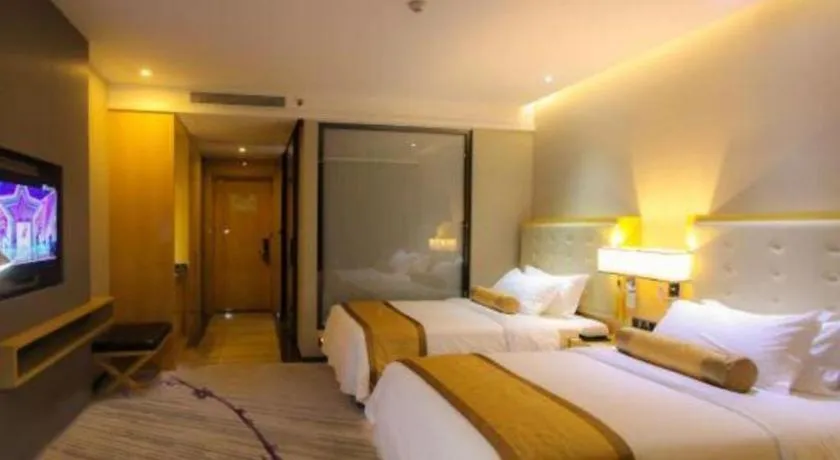 Bed in Golden Phoenix International Hotel