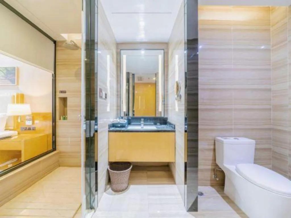 Bed in Golden Phoenix International Hotel