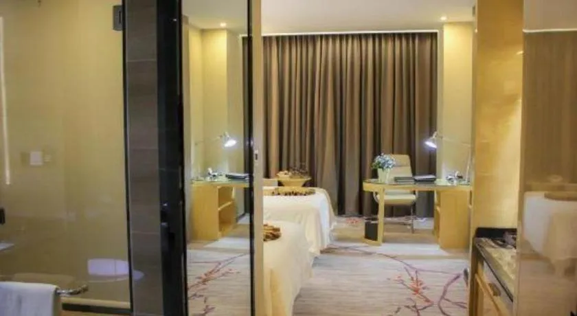 Bed in Golden Phoenix International Hotel