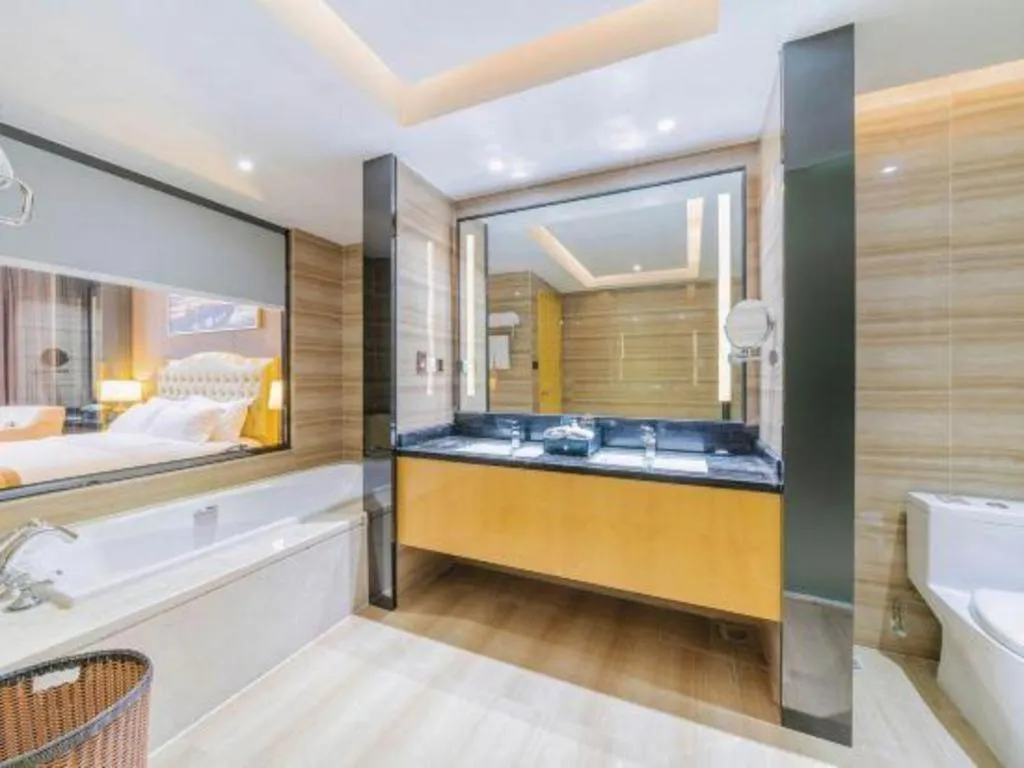 Bed in Golden Phoenix International Hotel