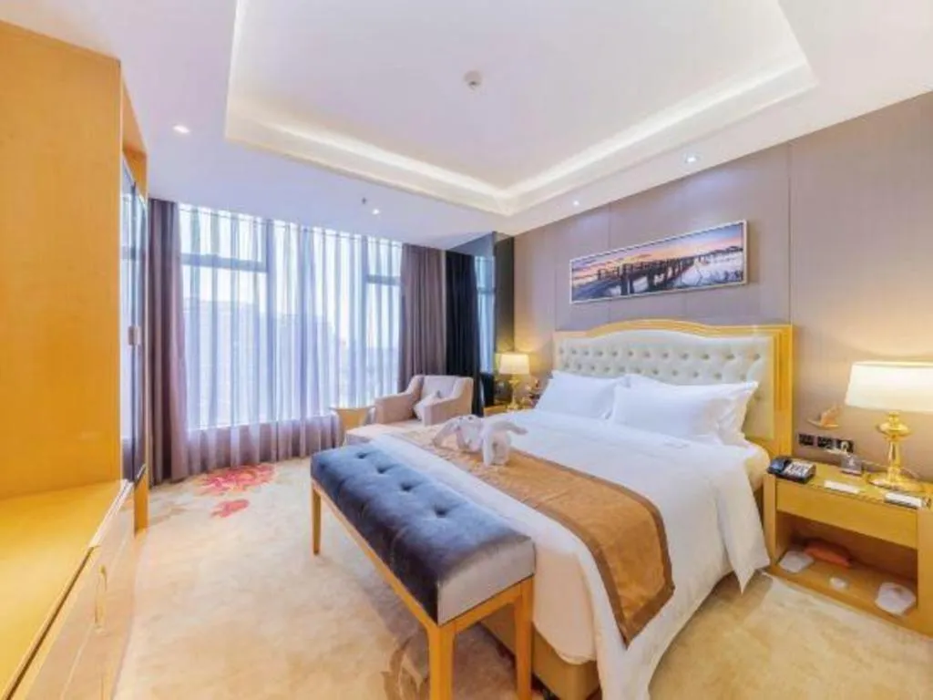 Bed in Golden Phoenix International Hotel