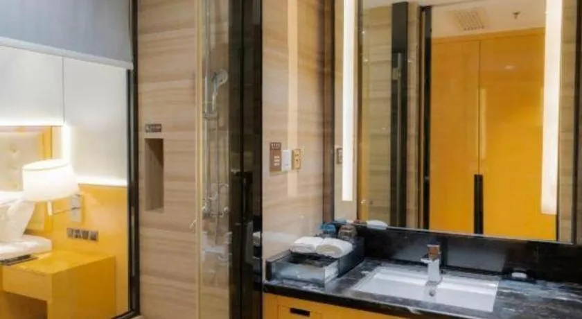 Bed in Golden Phoenix International Hotel