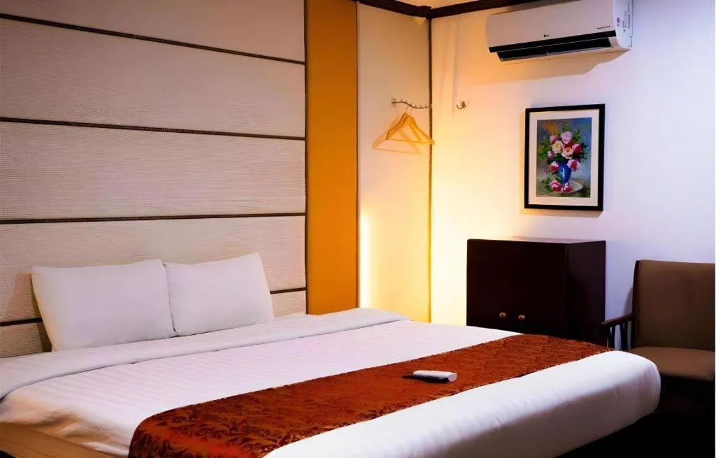 Bed in Horizon Hotel