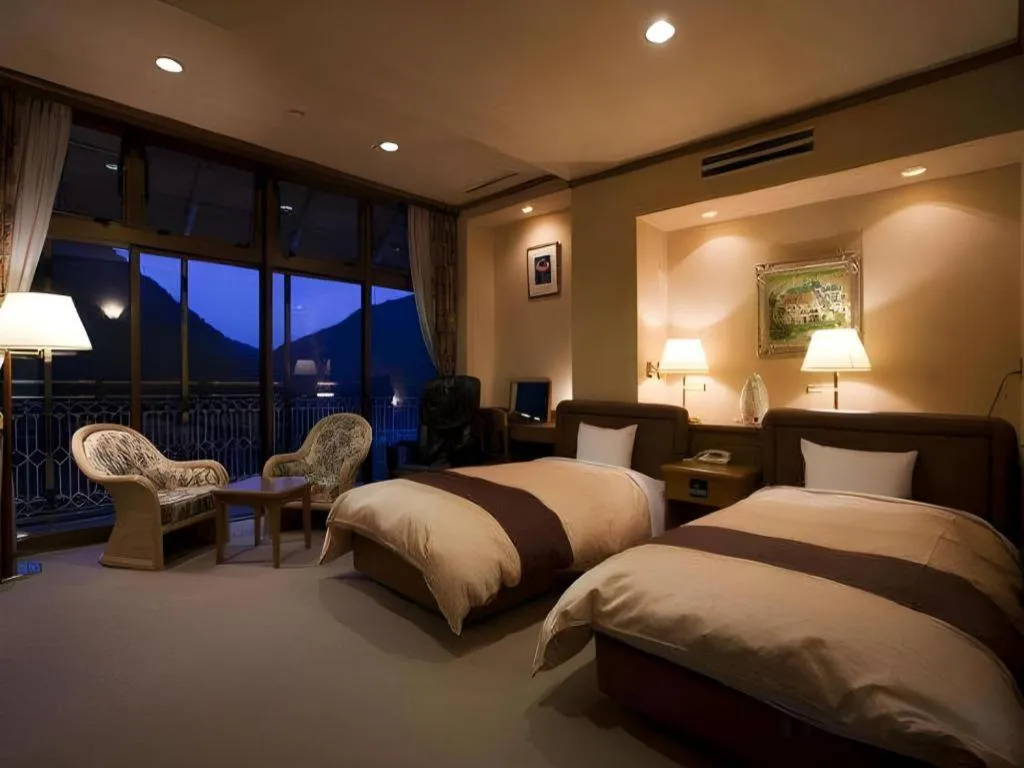 Bed in Hotel Hikyounoyu
