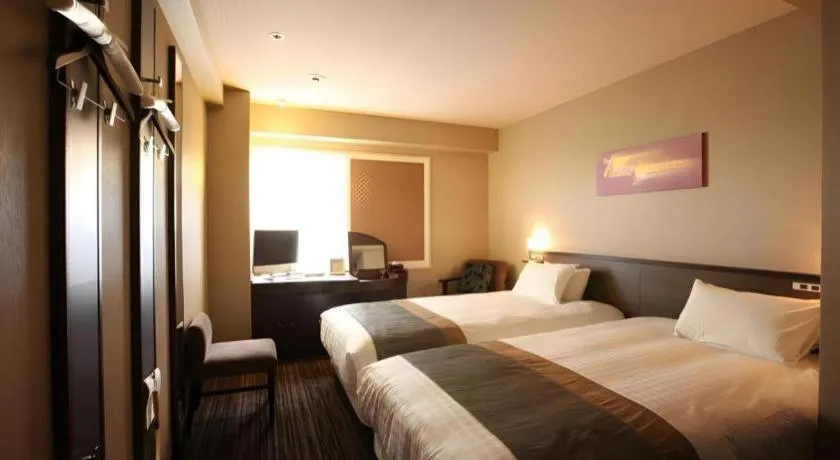 Bed in Ochanomizu Hotel Juraku