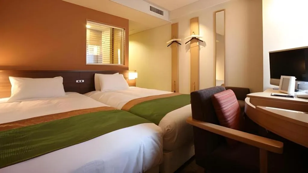 Bed in Ochanomizu Hotel Juraku