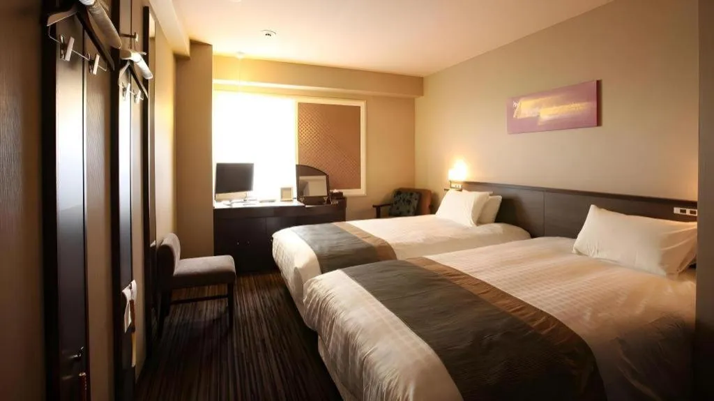 Bed in Ochanomizu Hotel Juraku