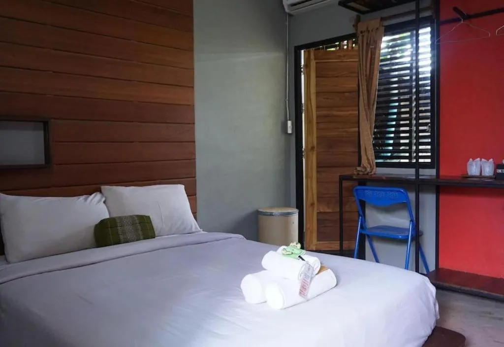 Bed in Huen Chang Puek Hotel