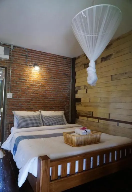 Bed in Huen Chang Puek Hotel