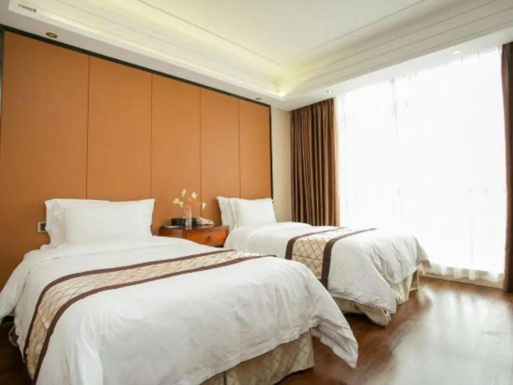 Bed in Auspicious Hotel