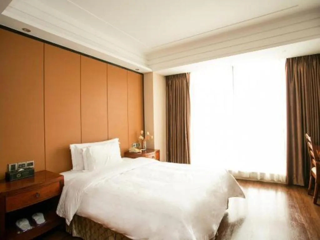 Bed in Auspicious Hotel