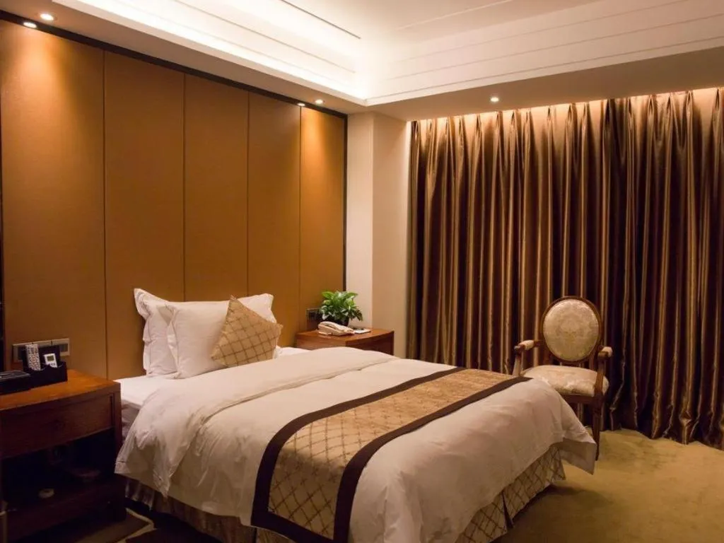 Bed in Auspicious Hotel