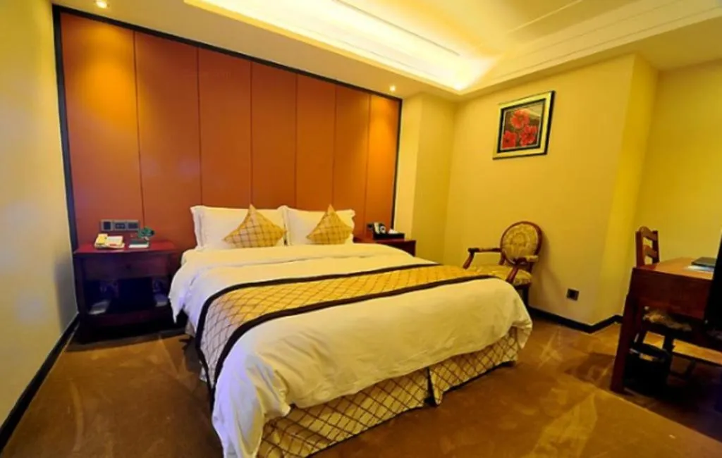 Bed in Auspicious Hotel