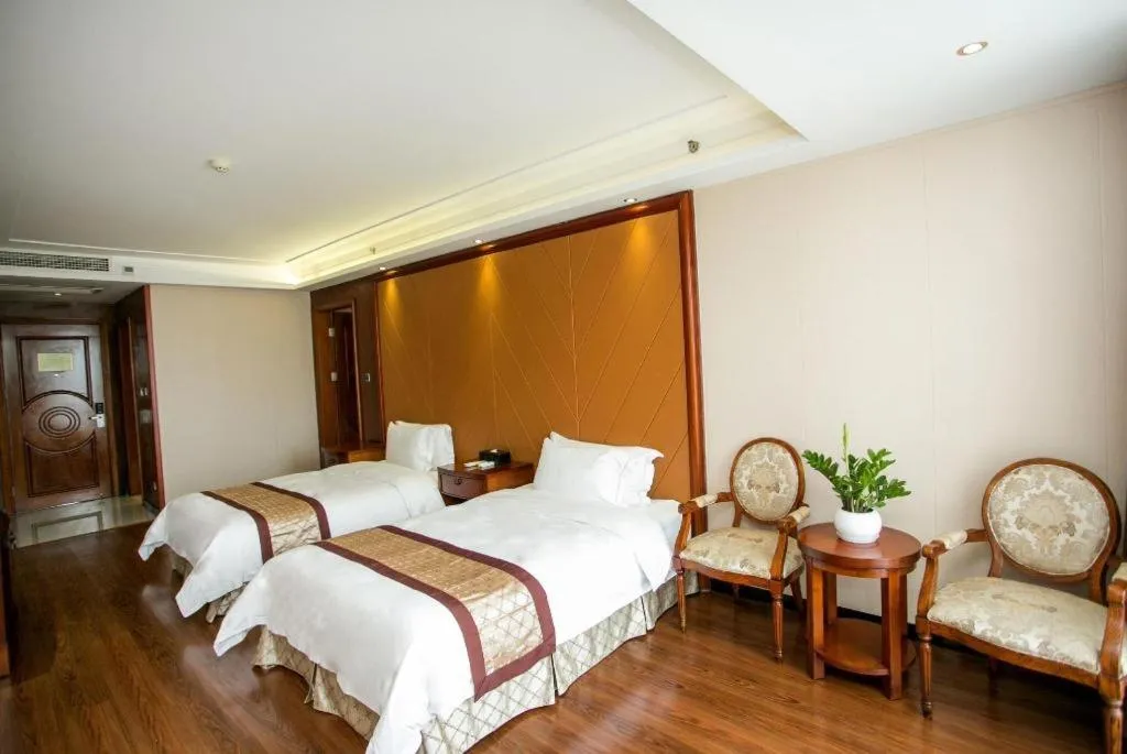 Bed in Auspicious Hotel