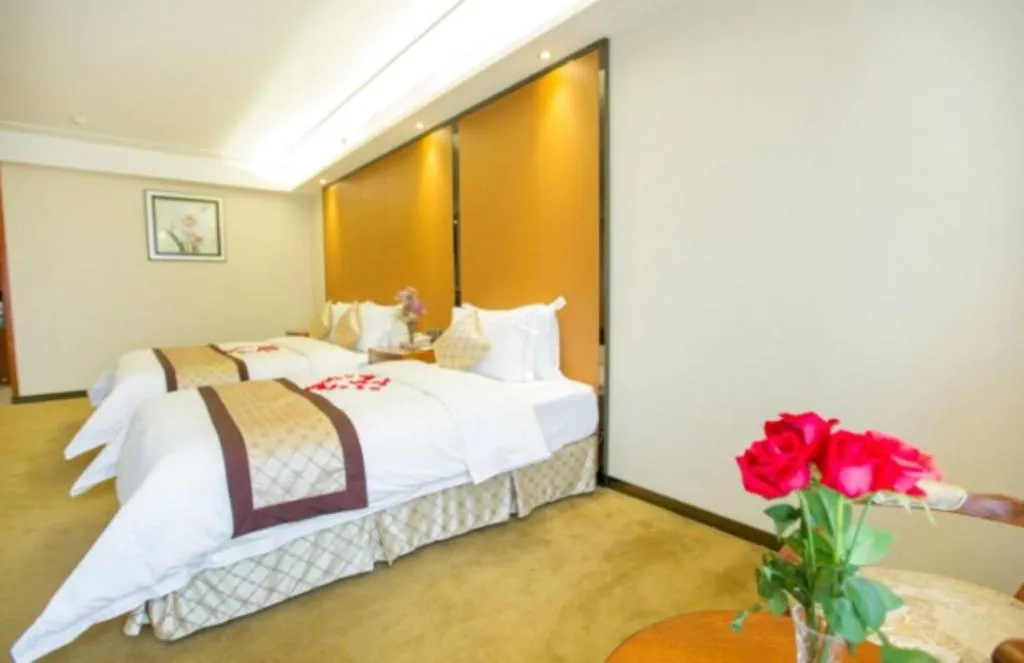 Bed in Auspicious Hotel