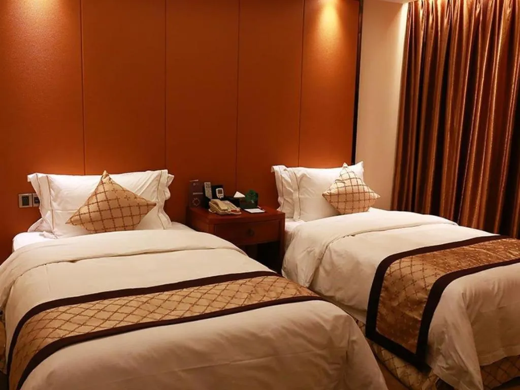 Bed in Auspicious Hotel