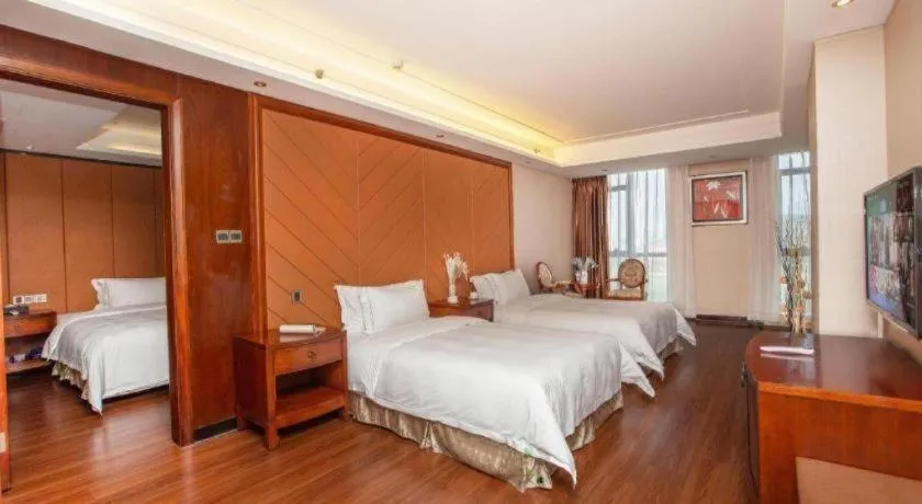 Bed in Auspicious Hotel