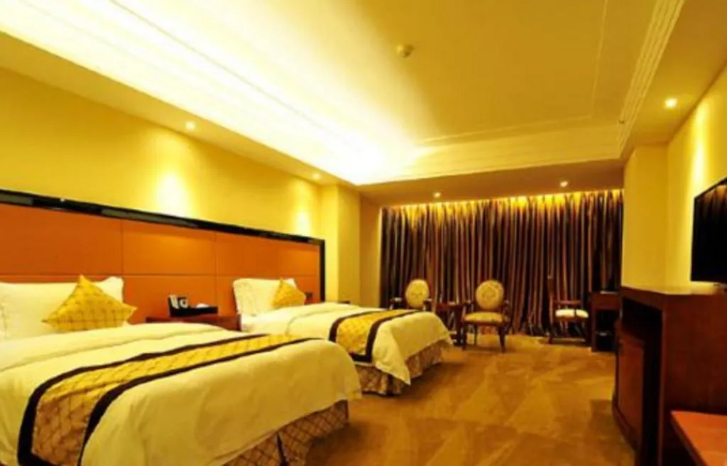 Bed in Auspicious Hotel