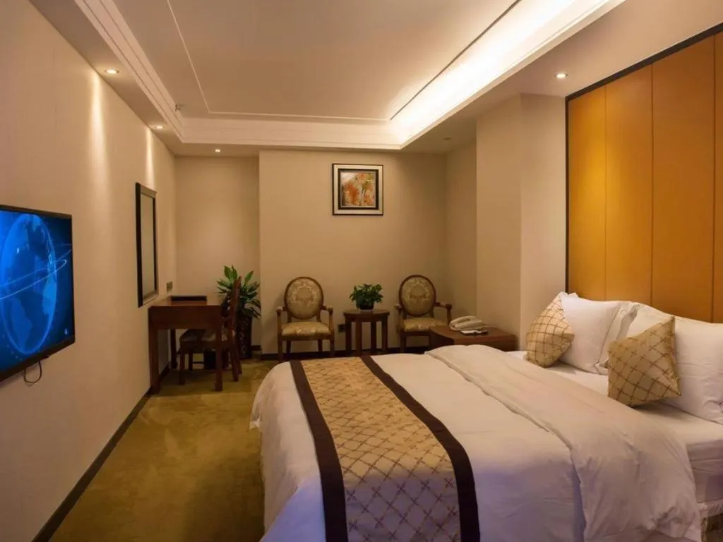 Bed in Auspicious Hotel