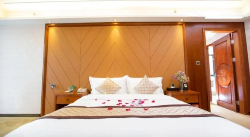 Bed in Auspicious Hotel