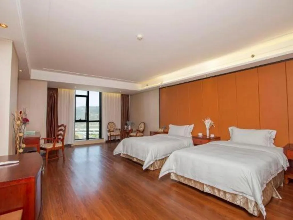 Bed in Auspicious Hotel